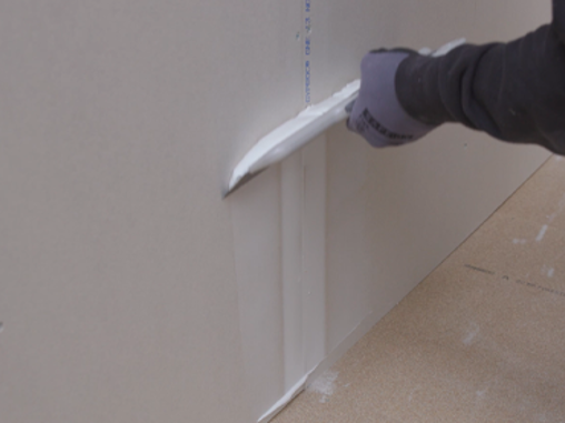 Förbered gipsvägg för rullspackel